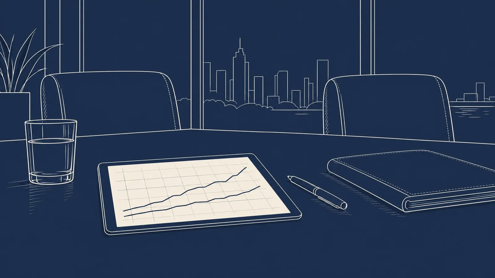 A tablet showing a simple line chart beside a closed portfolio and a pen on a boardroom table.